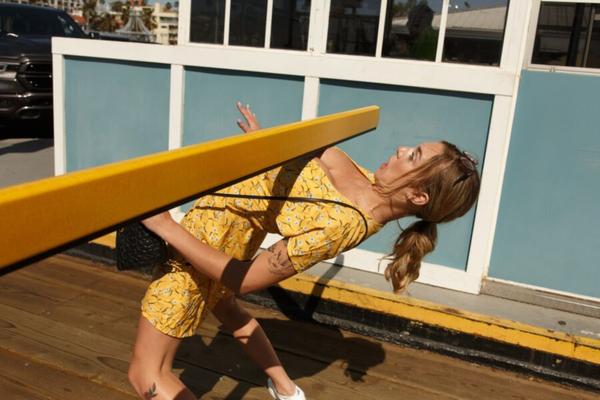 Gabbie Carter: Yellow sundress outdoors flashing