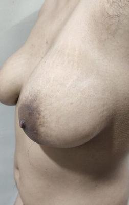 Las tetas naturales de mi esposa