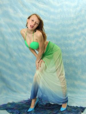 Marina modeling in a Green Clamshell Bra and Bikini