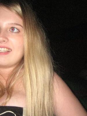 Chubby blonde - Big boobs, tights and short skirt. Very sexy