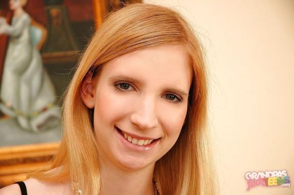 Skinny pregnant redhead