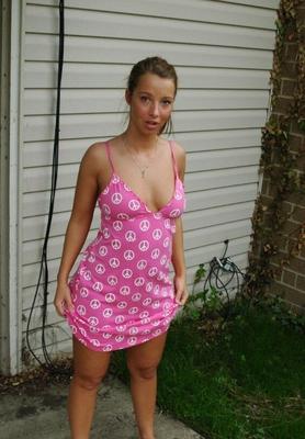 Blue Eyed Cutie with Big Tits Poses Indoors and Out